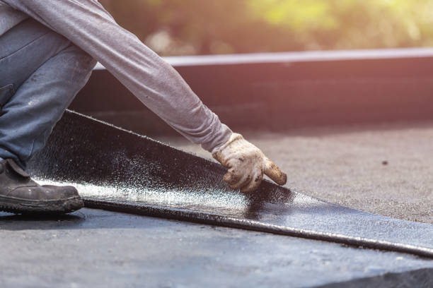 Professional Basement Waterproofing technician working in Hopkins, MI